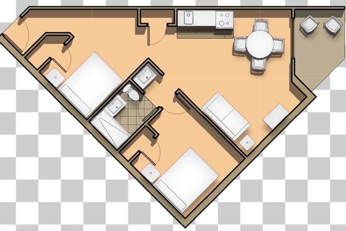A floor plan of a hotel room with a bed, a desk, a chair, a small bathroom, and a kitchenette.