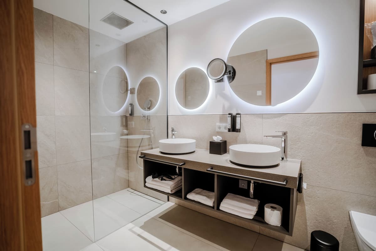 premium double room | bathroom | designer toiletries, hair dryer, slippers, towels