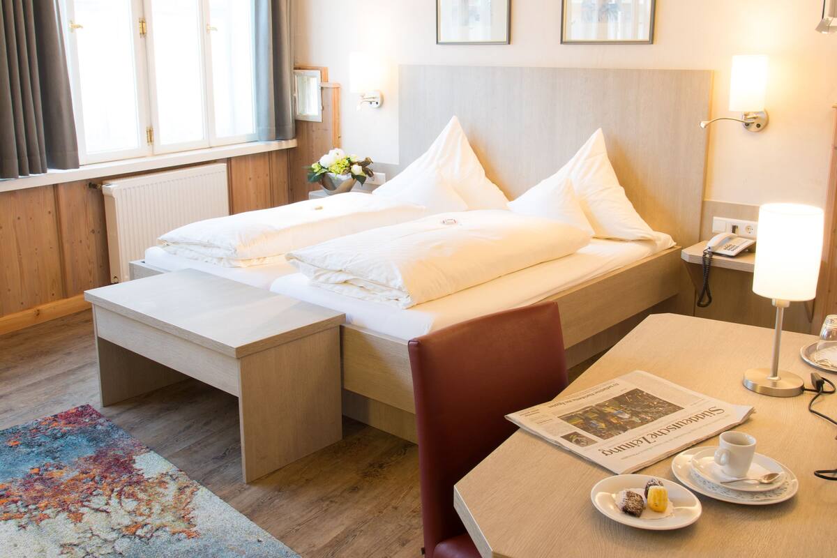 Egyptian cotton sheets, premium bedding, down duvets, pillow-top beds