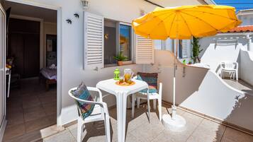 Standard Studio, Balcony, Ground Floor | Courtyard view