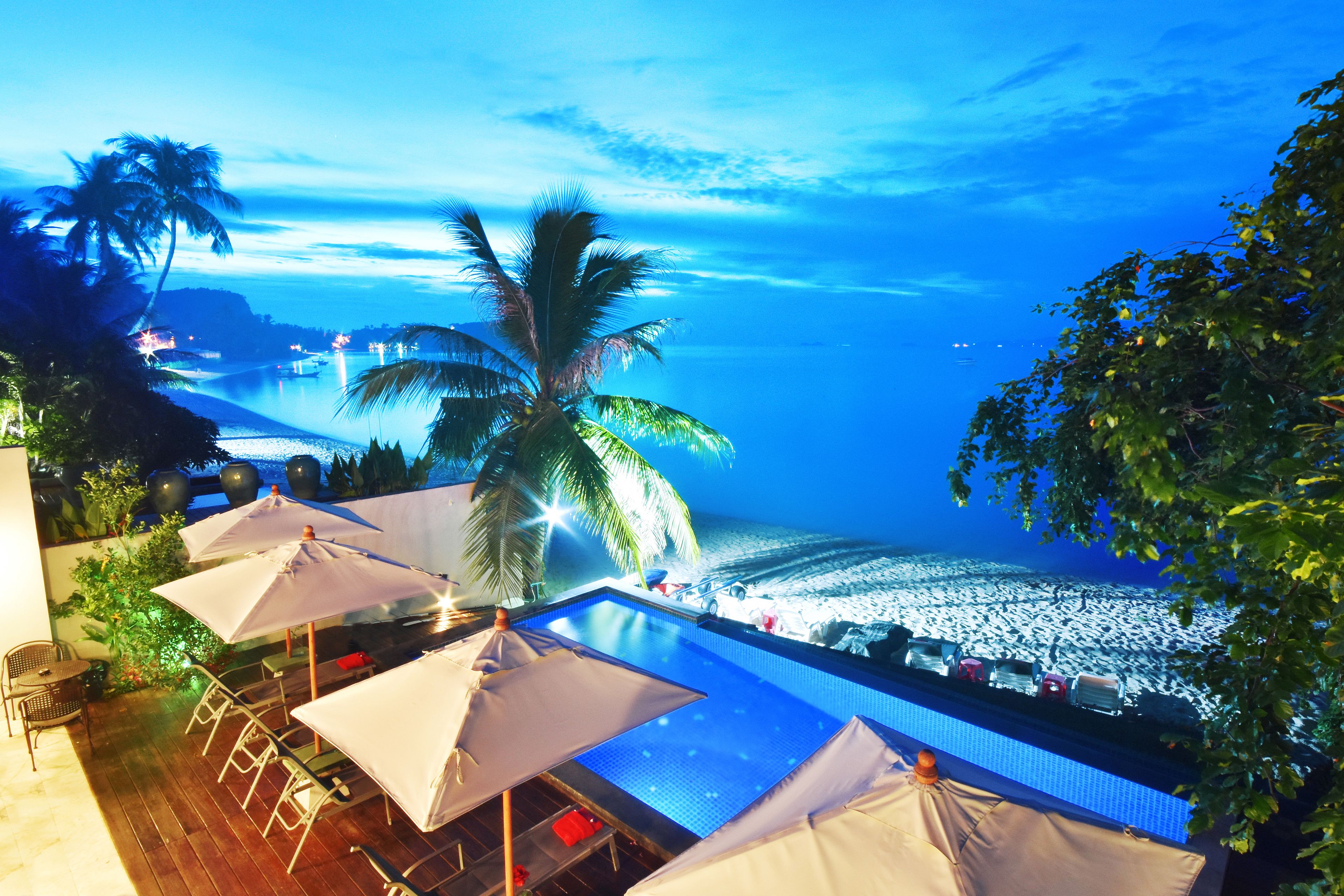 outdoor pool, pool umbrellas, pool loungers