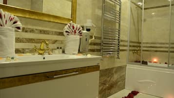 Shower, hair dryer, slippers, towels