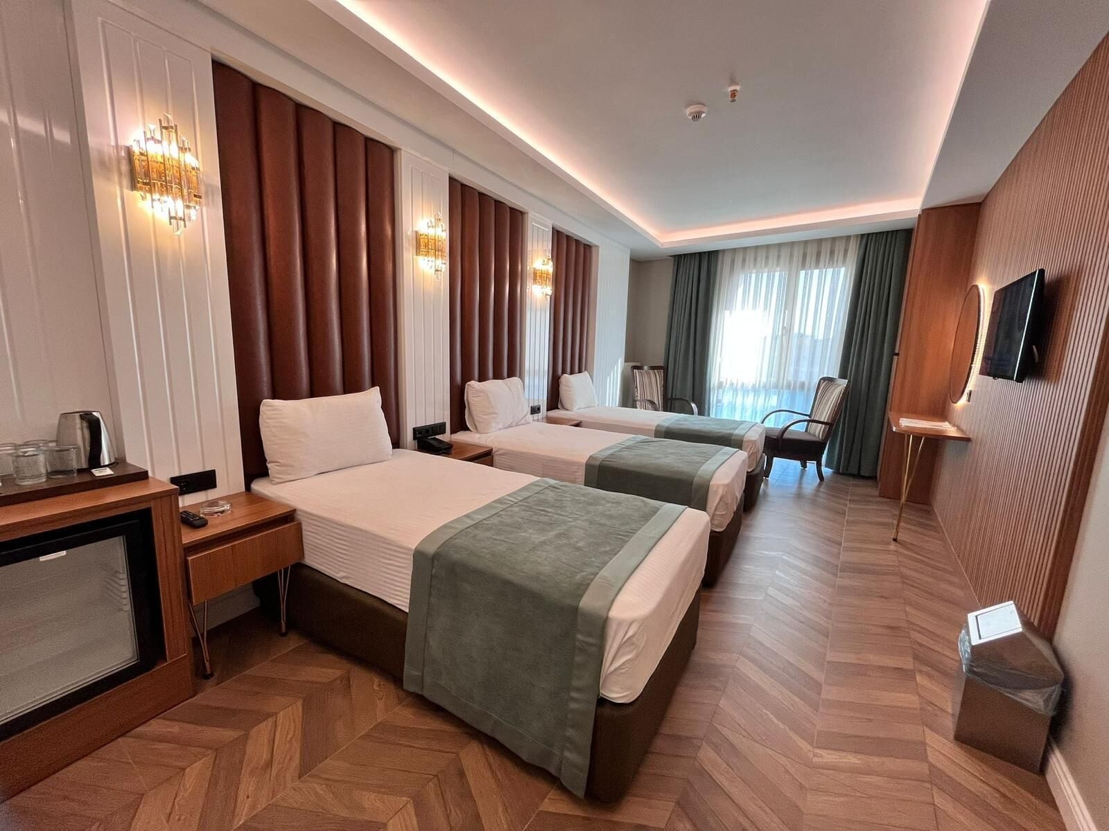 Deluxe Triple Room | Premium bedding, minibar, in-room safe, individually decorated