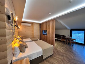 Suite Deluxe | Ropa de cama de alta calidad, minibar, caja fuerte