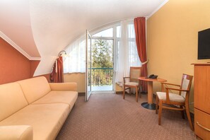 Suite – standard | Minibar, safe på rommet, skrivebord og blendingsgardiner