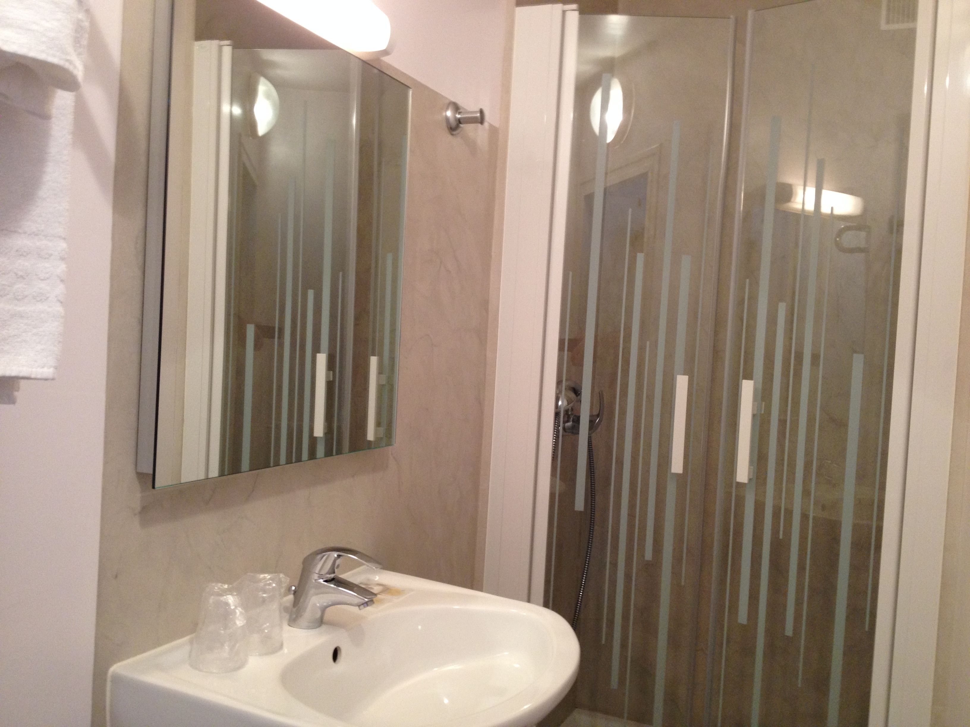 double room, courtyard view | bathroom | shower, free toiletries, hair dryer