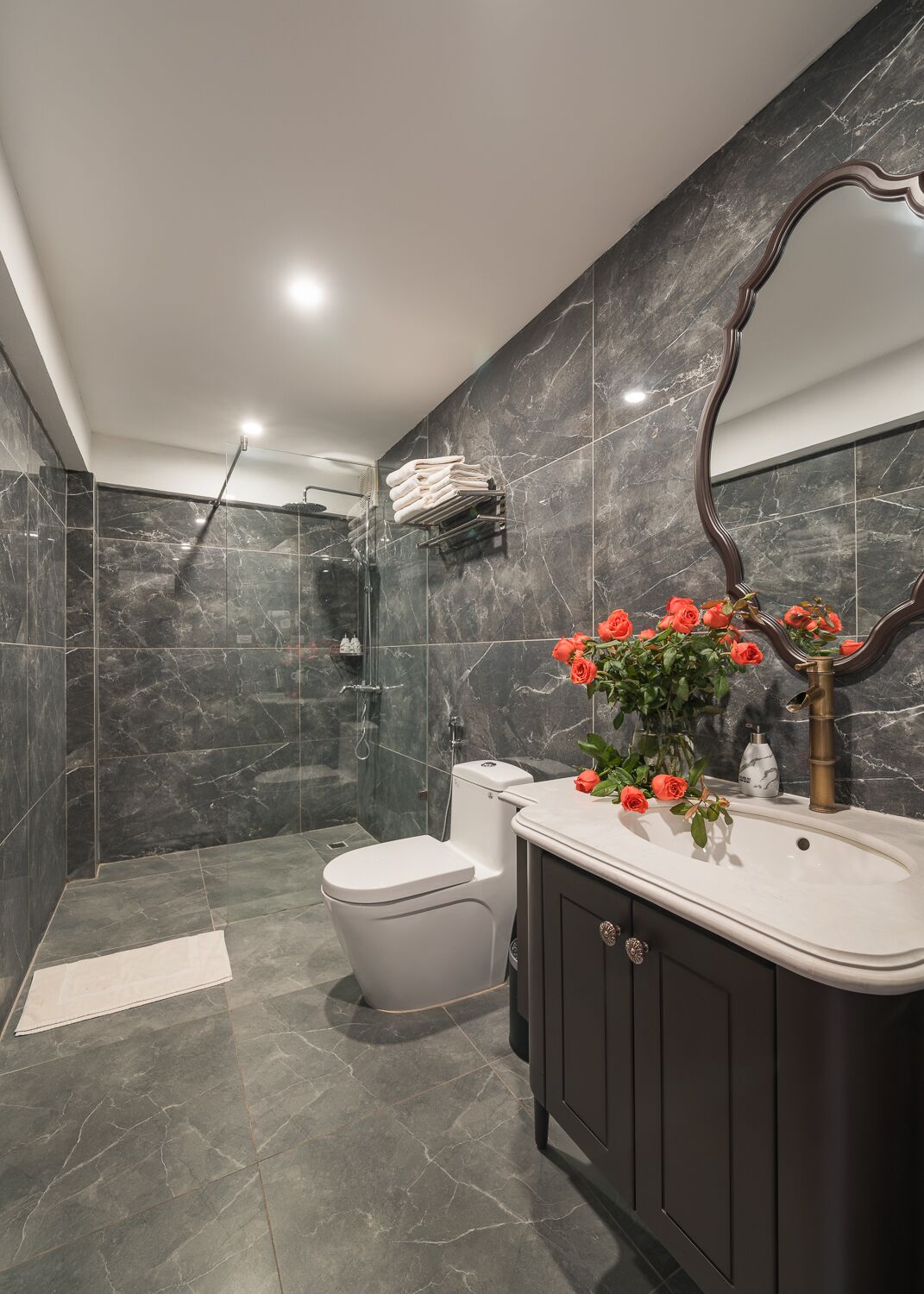 family suite, 1 bedroom, kitchen, city view (1 king bed and 2 single beds) | bathroom | spring water bathtub, rainfall showerhead, designer toiletries