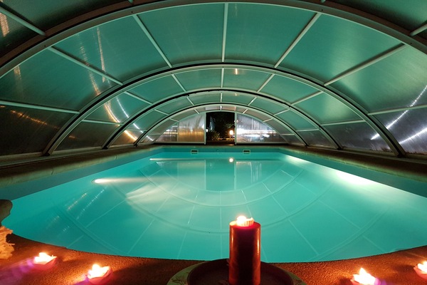 Indoor pool, outdoor pool, open 10:00 AM to 8:00 PM, pool umbrellas