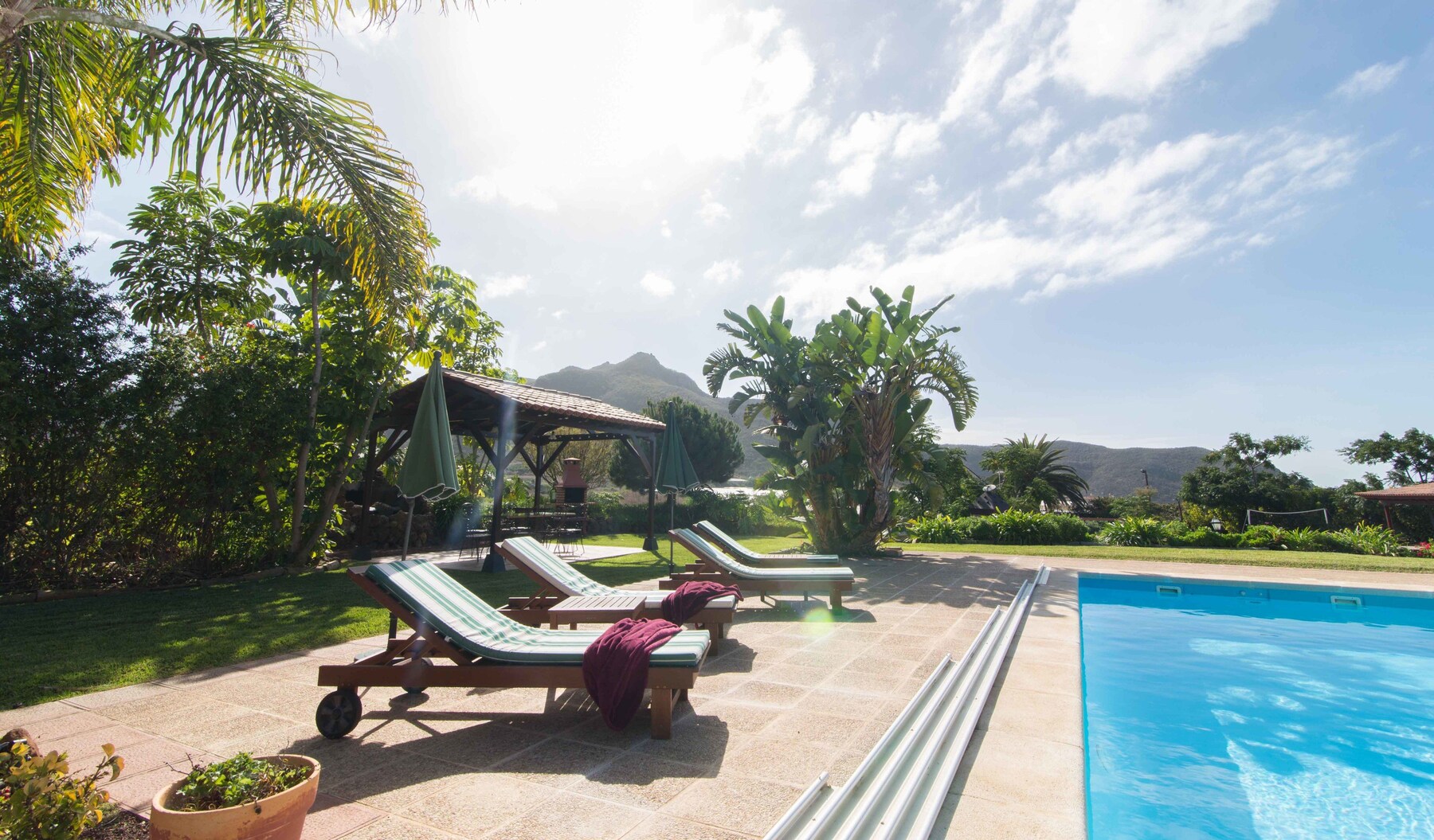 Indoor pool, outdoor pool, open 10:00 AM to 8:00 PM, pool umbrellas