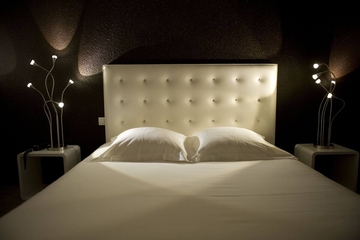 desk, blackout curtains, soundproofing, iron/ironing board