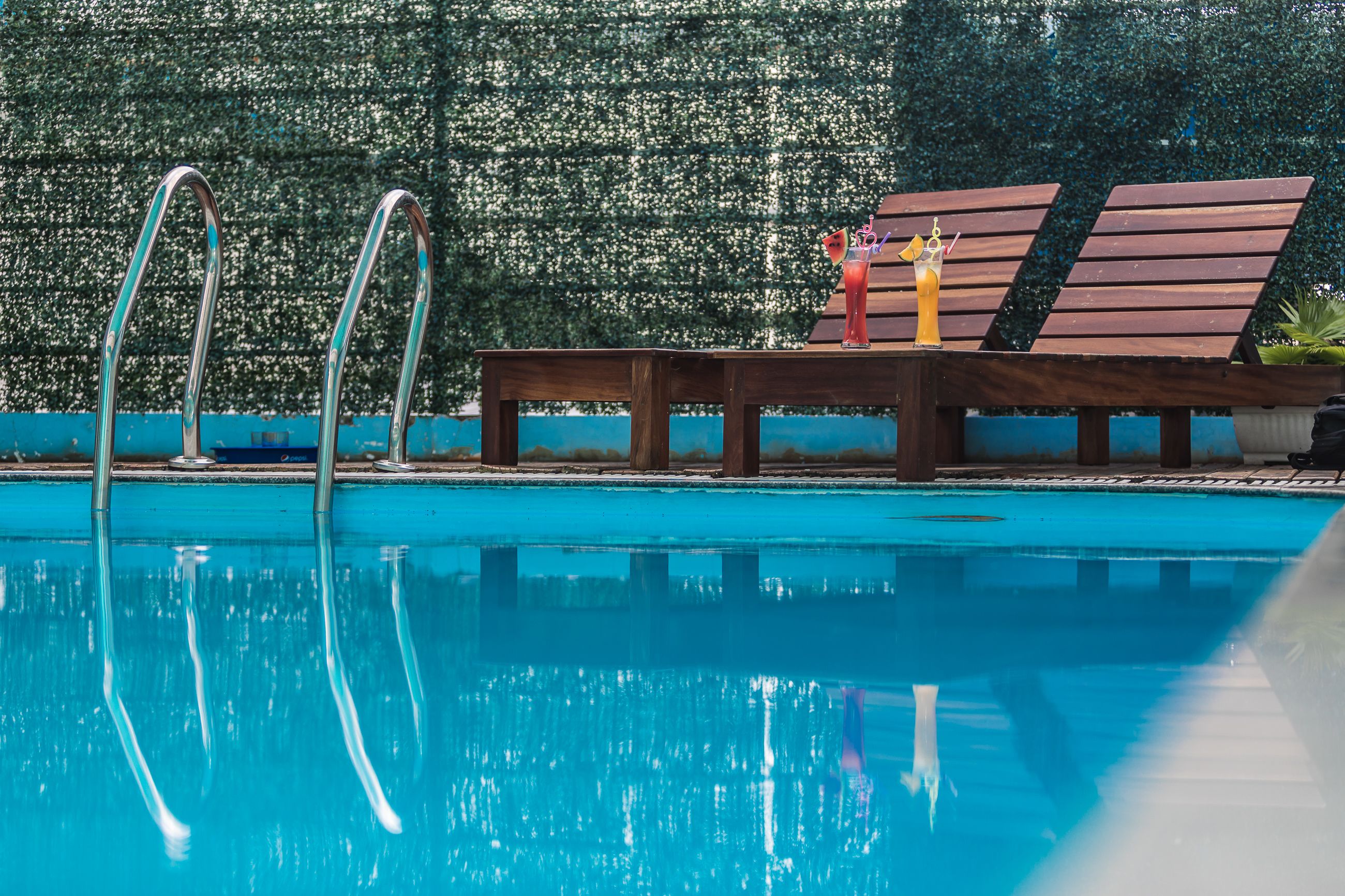 indoor pool, outdoor pool, pool loungers