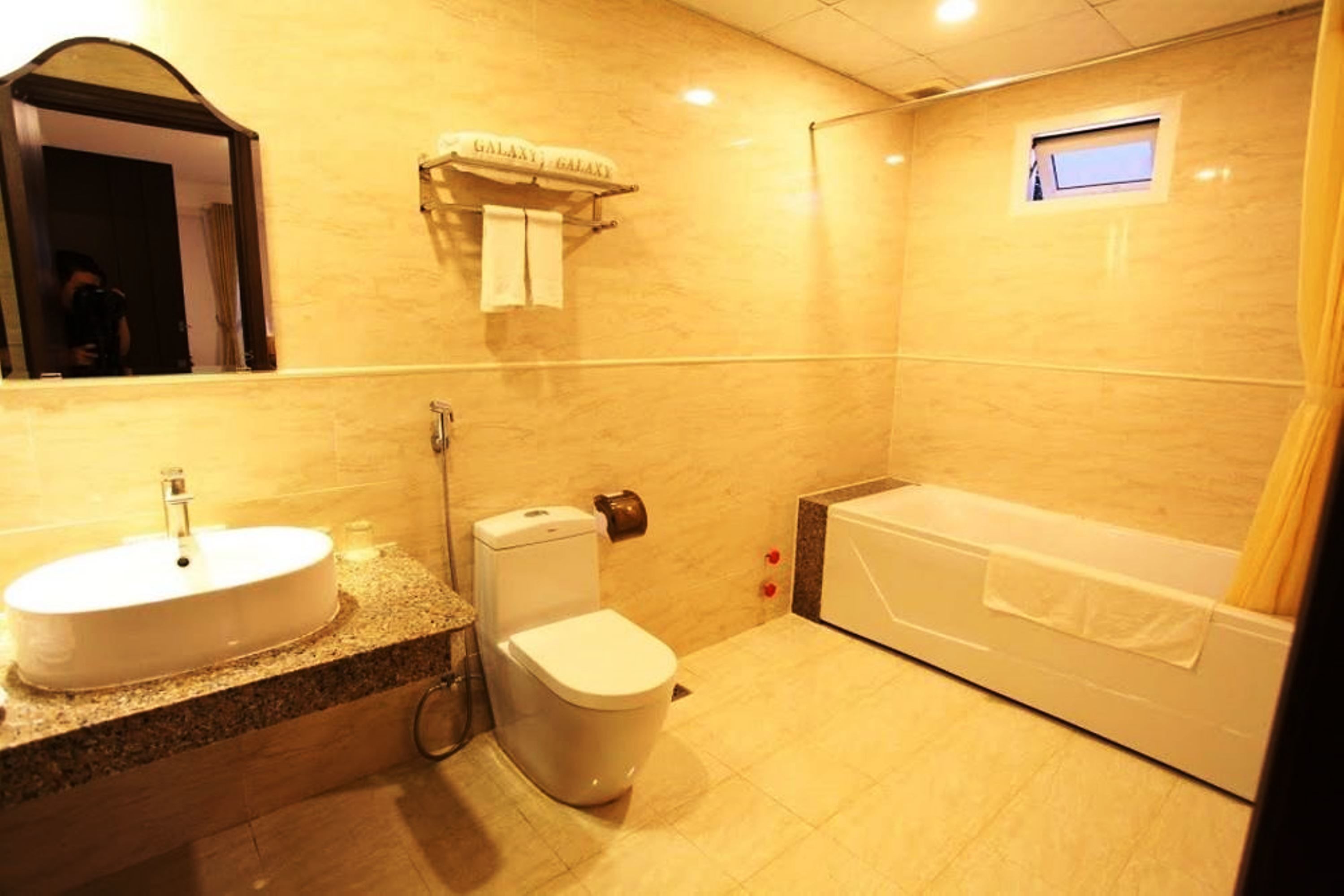 family quadruple room | bathroom | hair dryer, slippers, bidet, towels