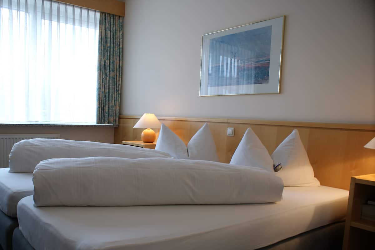 Hypo-allergenic bedding, free minibar, in-room safe, desk