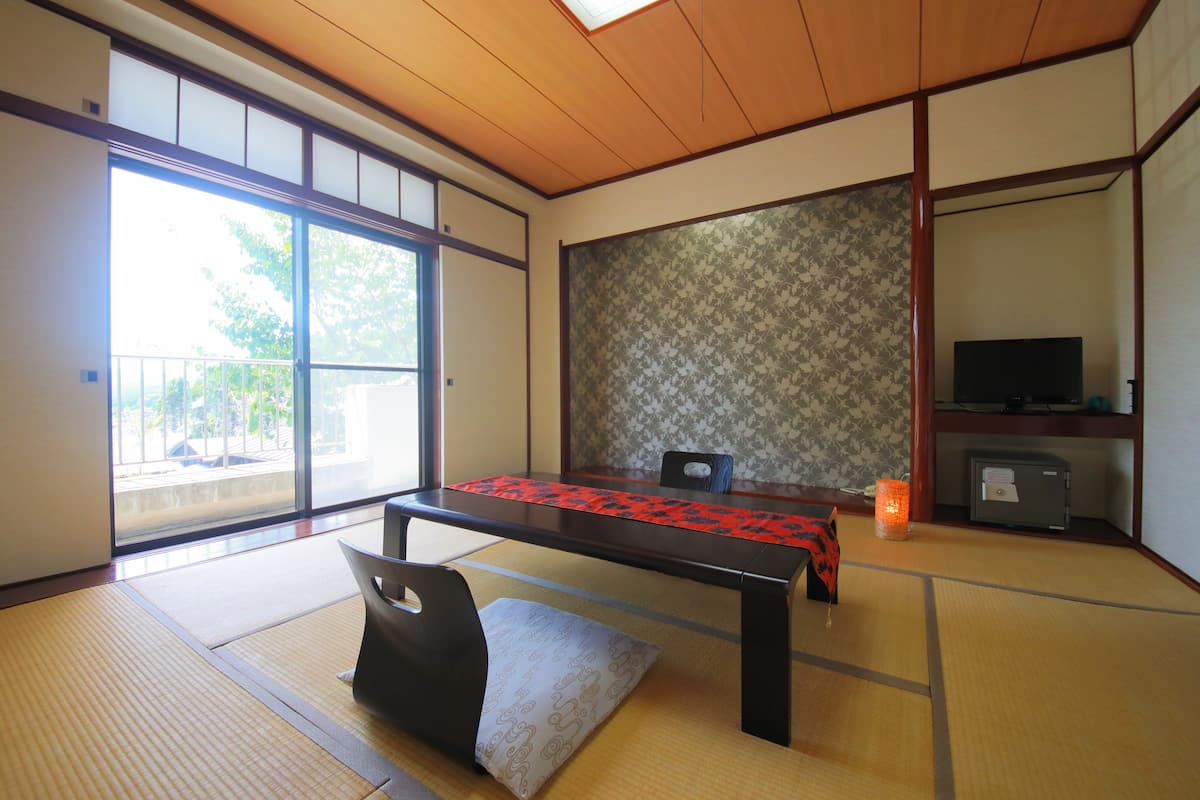 Quarto em estilo japonês, banheiro compartilhado (Japanese Style) | Wi-Fi de cortesia, roupa de cama
