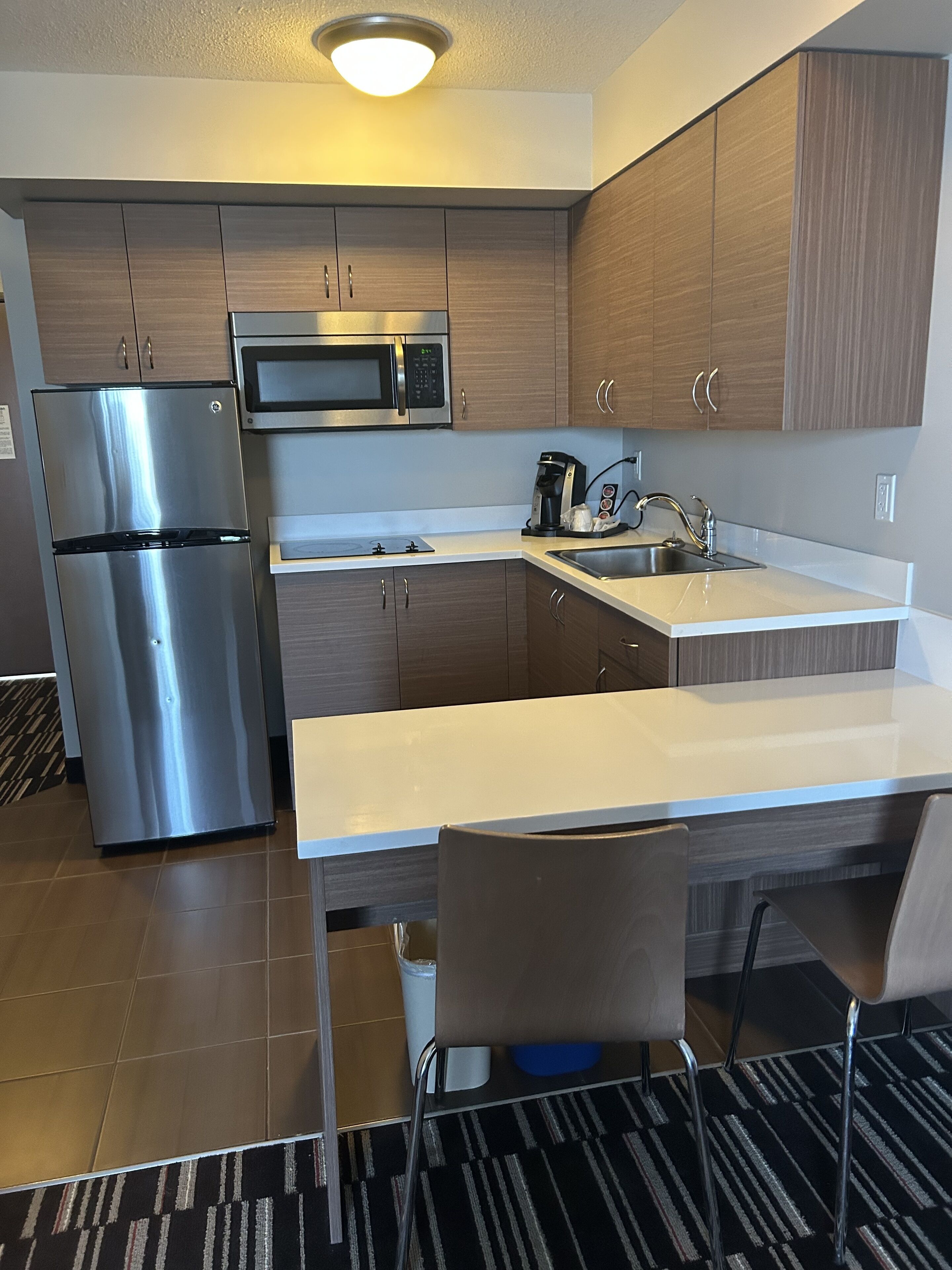 suite, 1 bedroom, non smoking (1 queen bed) | private kitchen | fridge, microwave, coffee/tea maker