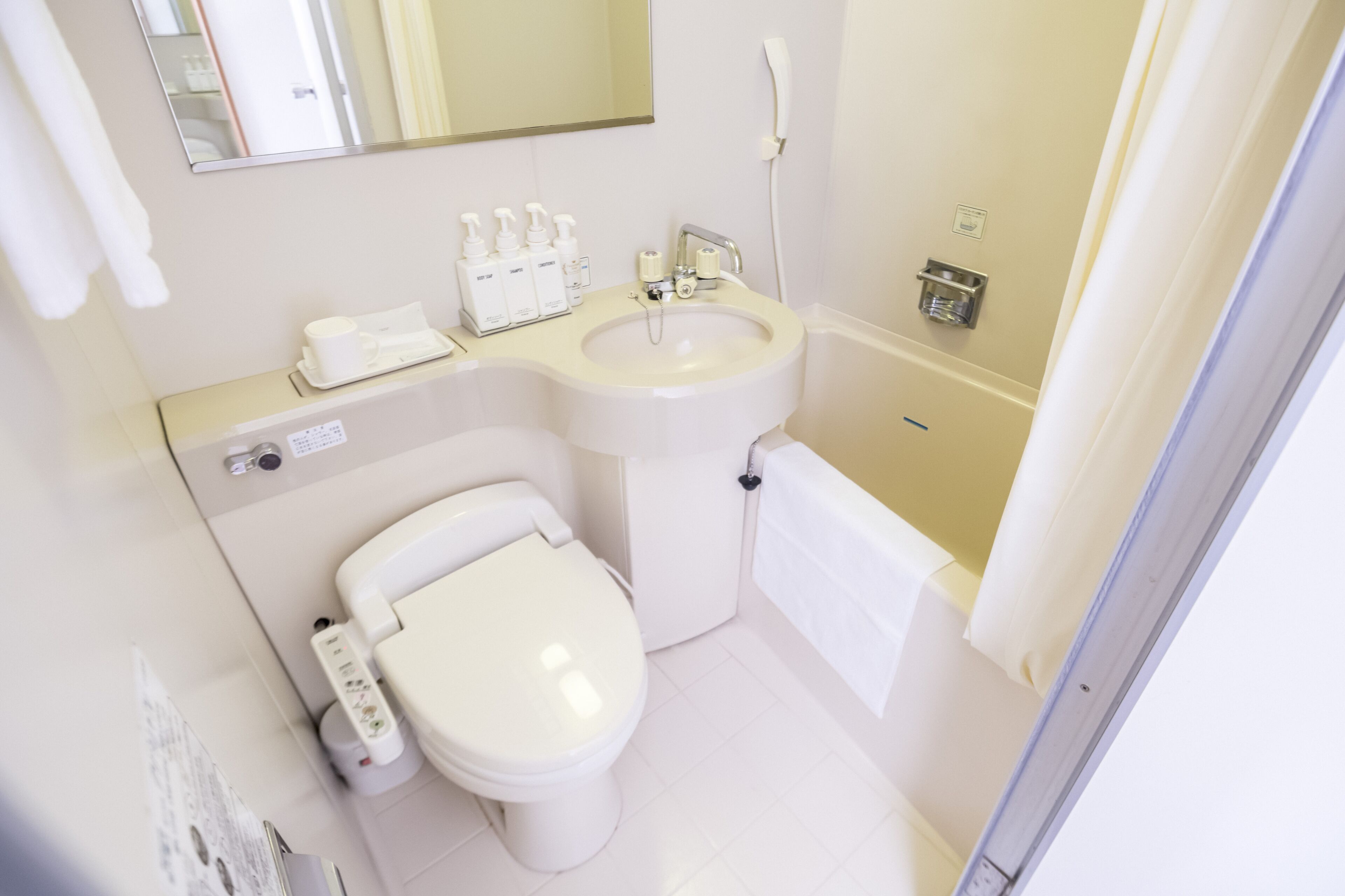 combined shower/bathtub, free toiletries, hair dryer, slippers