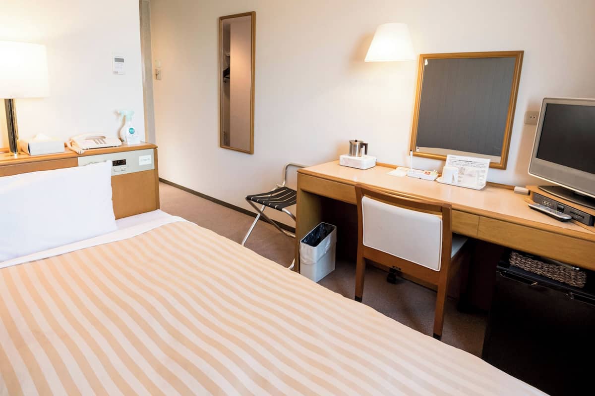 Desk, laptop workspace, iron/ironing board (on request), WiFi (free)