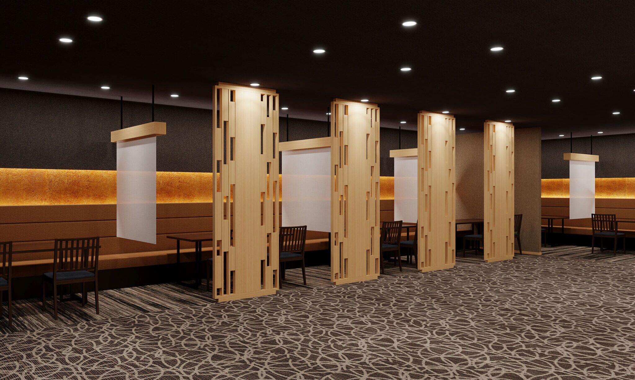 A hotel lobby with a modern design, featuring a reception desk, seating area, and patterned carpet.