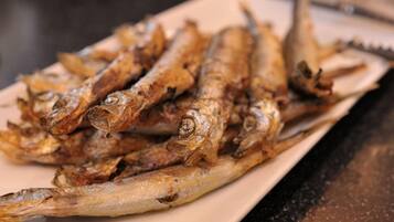 A plate of fried fish.