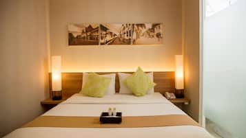 Superior Room | Minibar, in-room safe, desk, iron/ironing board