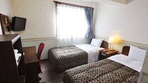 A hotel room with two beds, a desk with a chair, a television, and a window with curtains. - Futsukaichi Green Hotel (Chikushino)