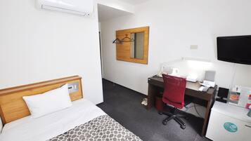 Desk, blackout curtains, free WiFi, bed sheets