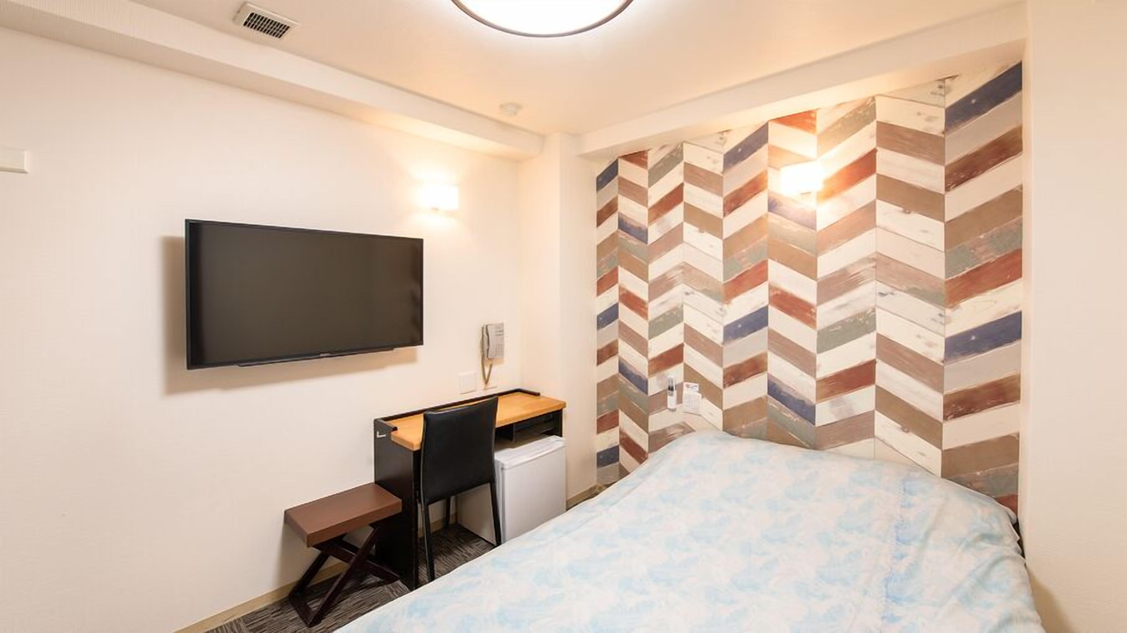 Desk, blackout curtains, soundproofing, free WiFi