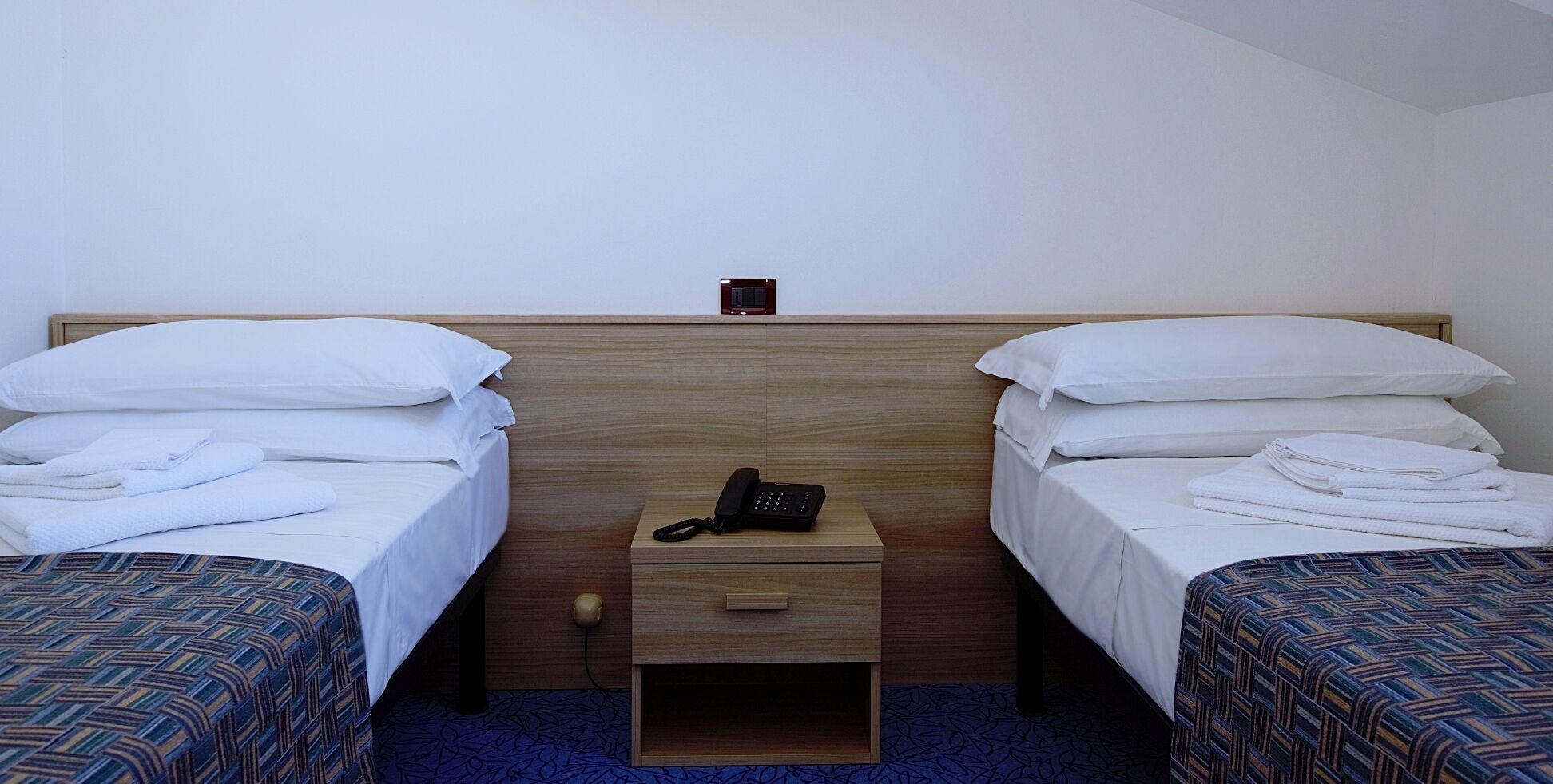 basic twin room (attic) | in-room safe, desk, free wifi, bed sheets