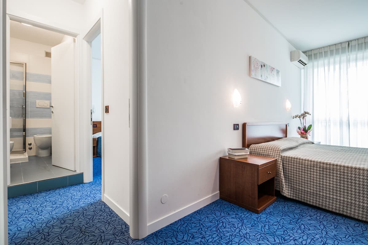 family room, 2 bedrooms, terrace, poolside | in-room safe, desk, free wifi, bed sheets