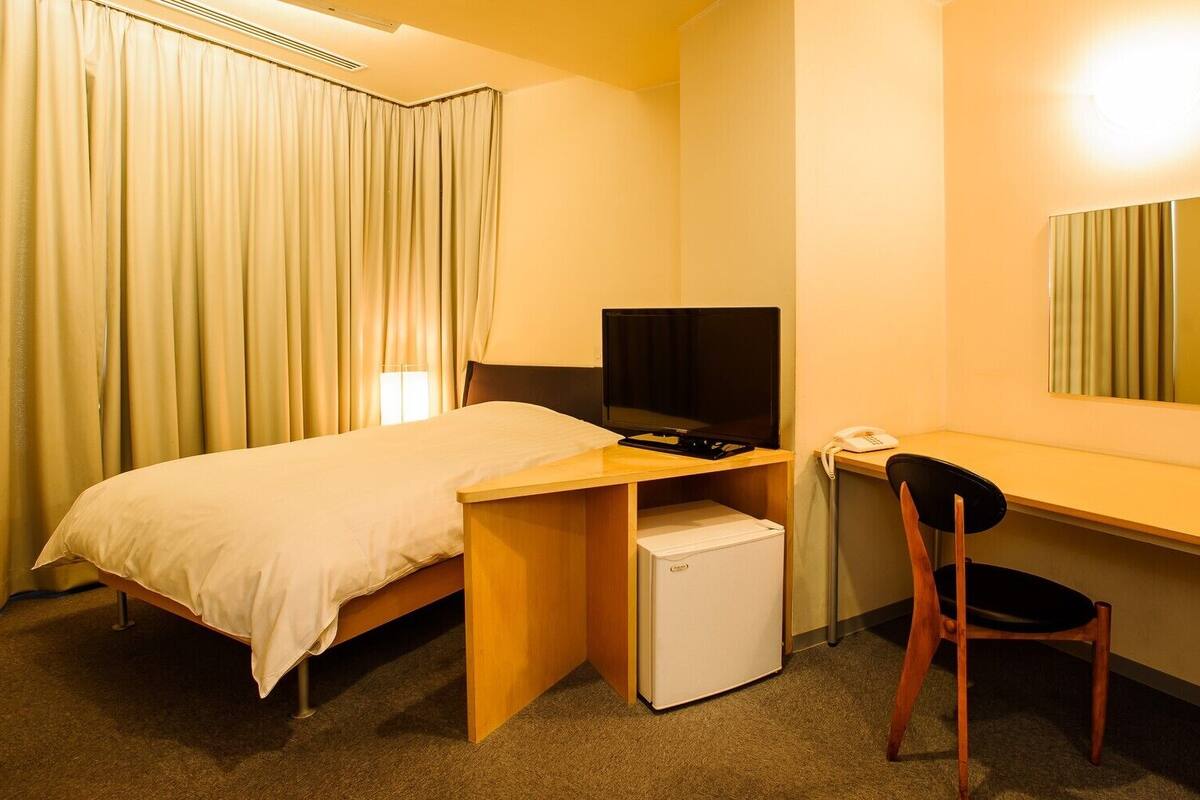 Desk, laptop workspace, blackout drapes, iron/ironing board (on request)