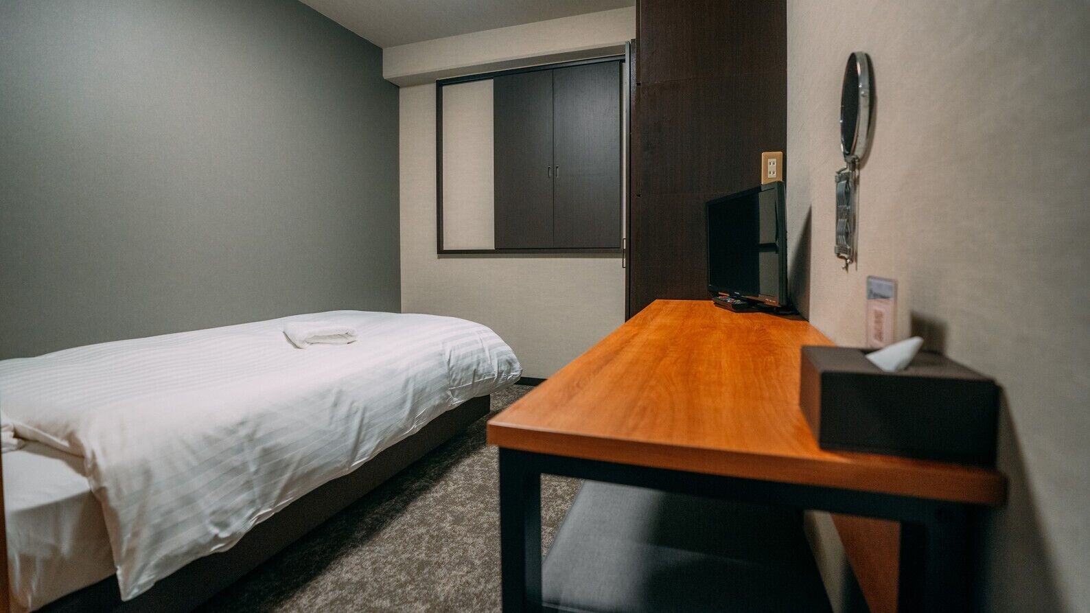 Desk, laptop workspace, blackout drapes, iron/ironing board