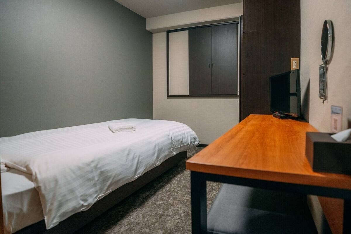 Desk, laptop workspace, blackout drapes, iron/ironing board (on request)