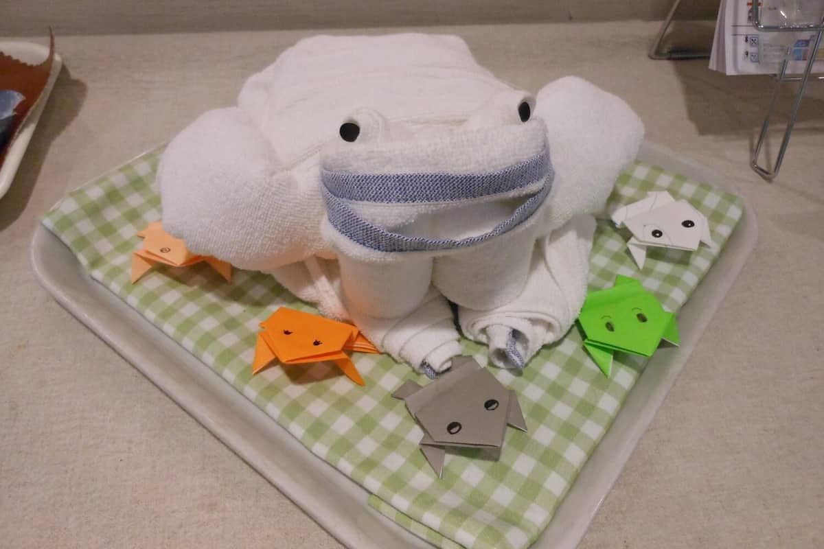 combined shower/bathtub, free toiletries, hair dryer, slippers