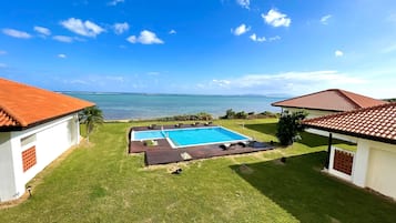 2nd Floor Villa Room, Ocean View | 1 bedroom, bed sheets