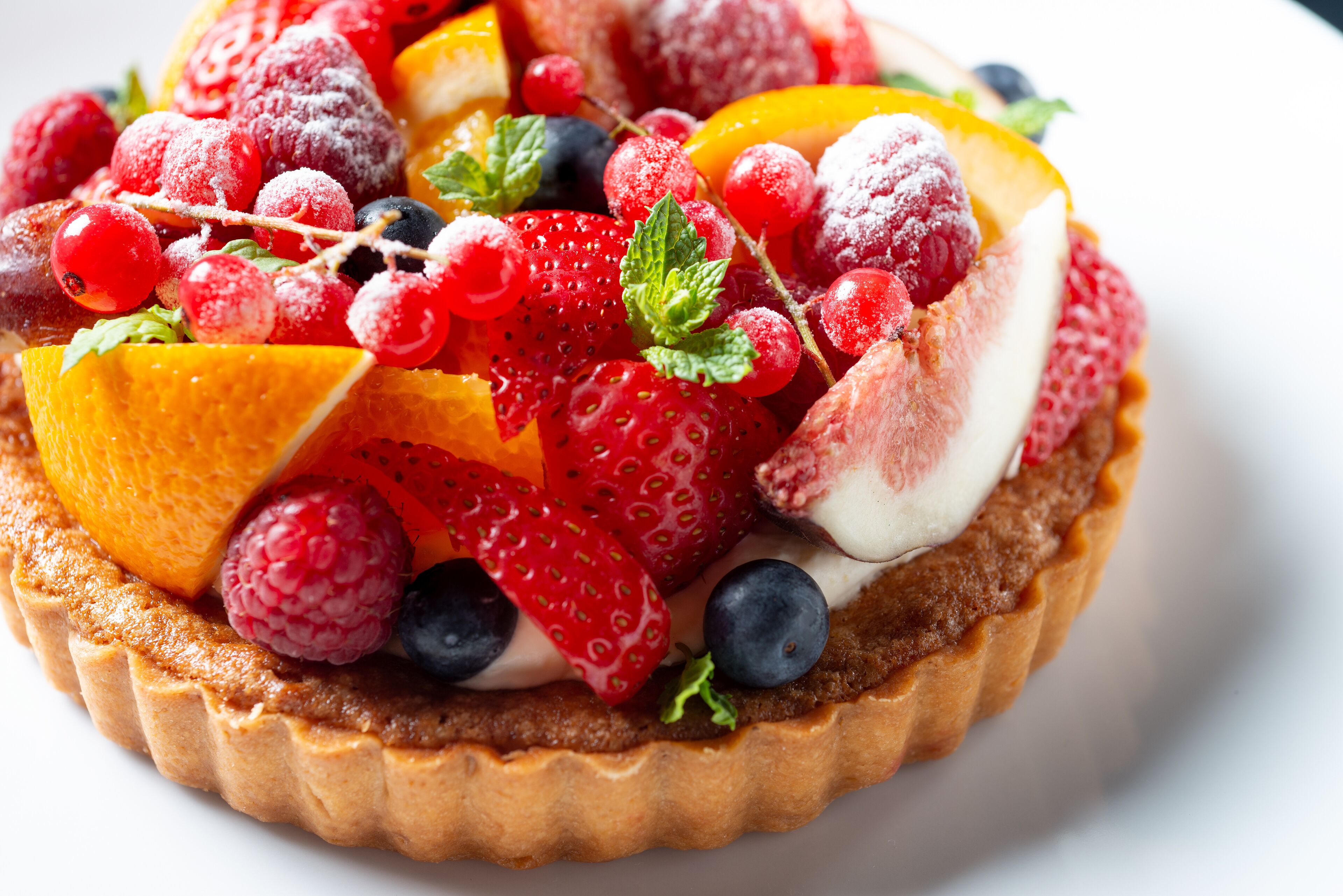 A tart with various fruits on top.