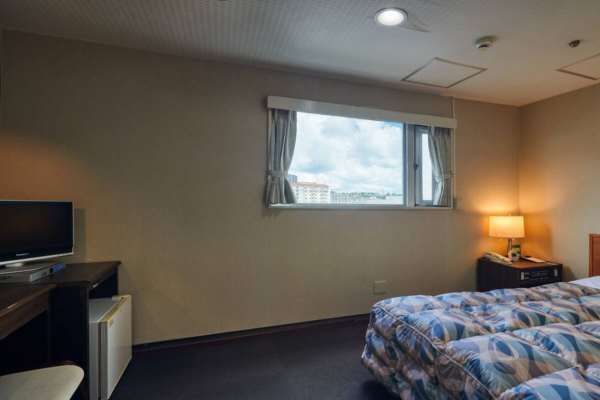 Desk, blackout drapes, iron/ironing board (on request), WiFi (free)