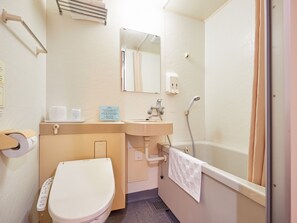 Combined shower/bathtub, free toiletries, hair dryer, bathrobes