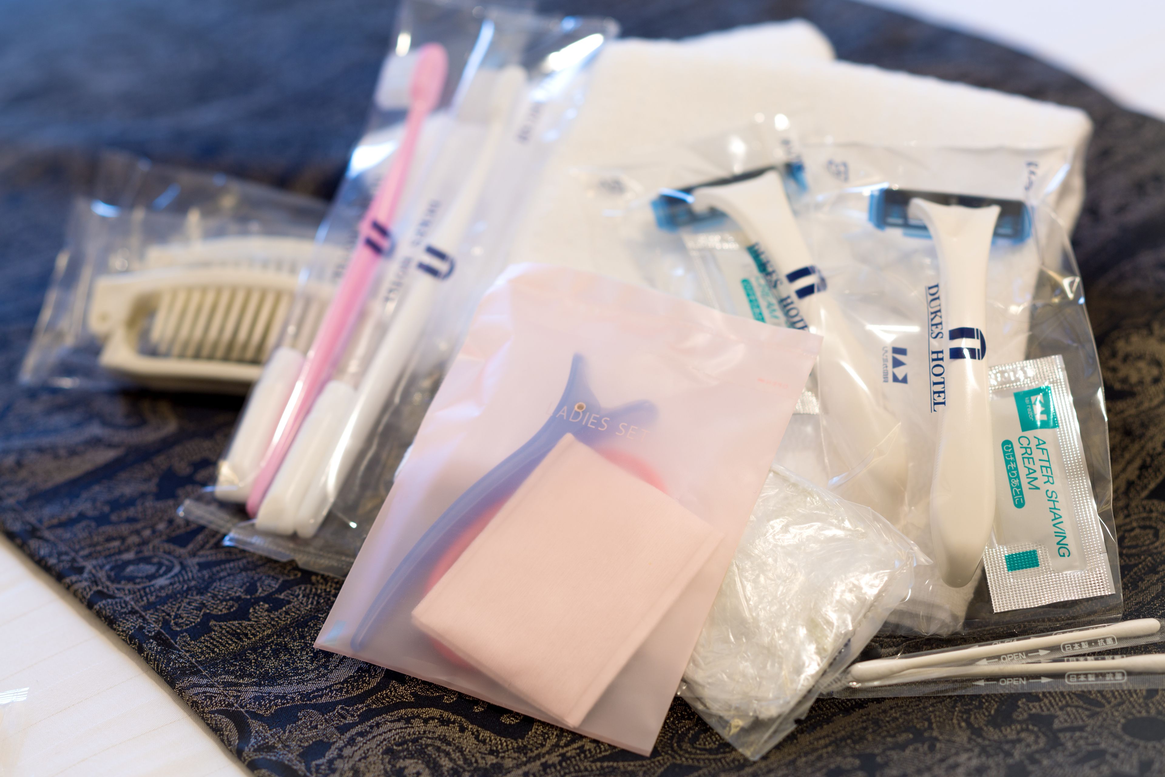 combined shower/bathtub, free toiletries, hair dryer, slippers