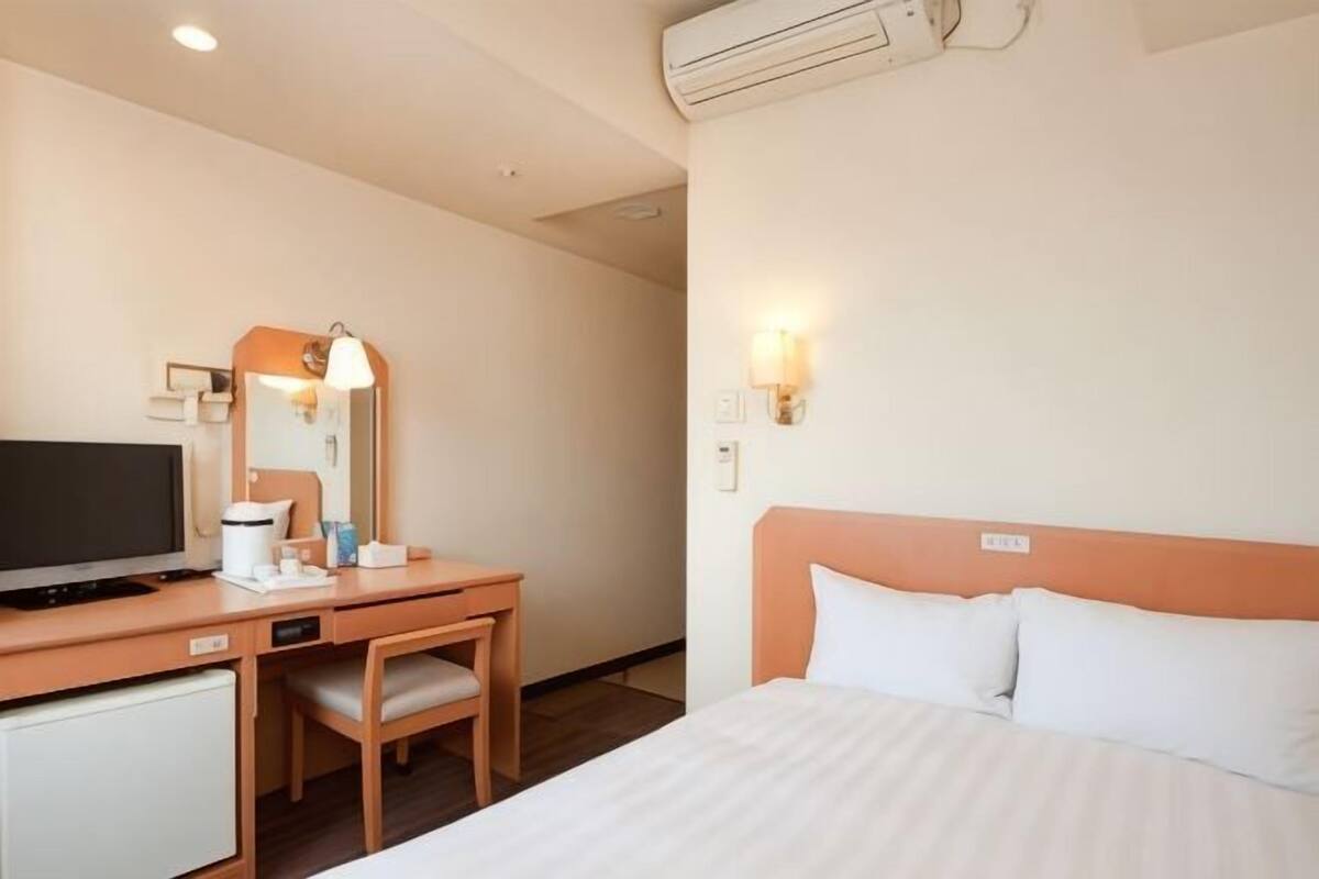 Desk, laptop workspace, blackout curtains, free WiFi