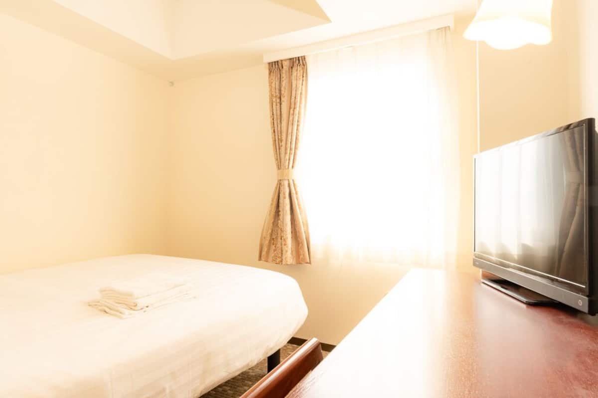 Desk, laptop workspace, blackout drapes, free WiFi