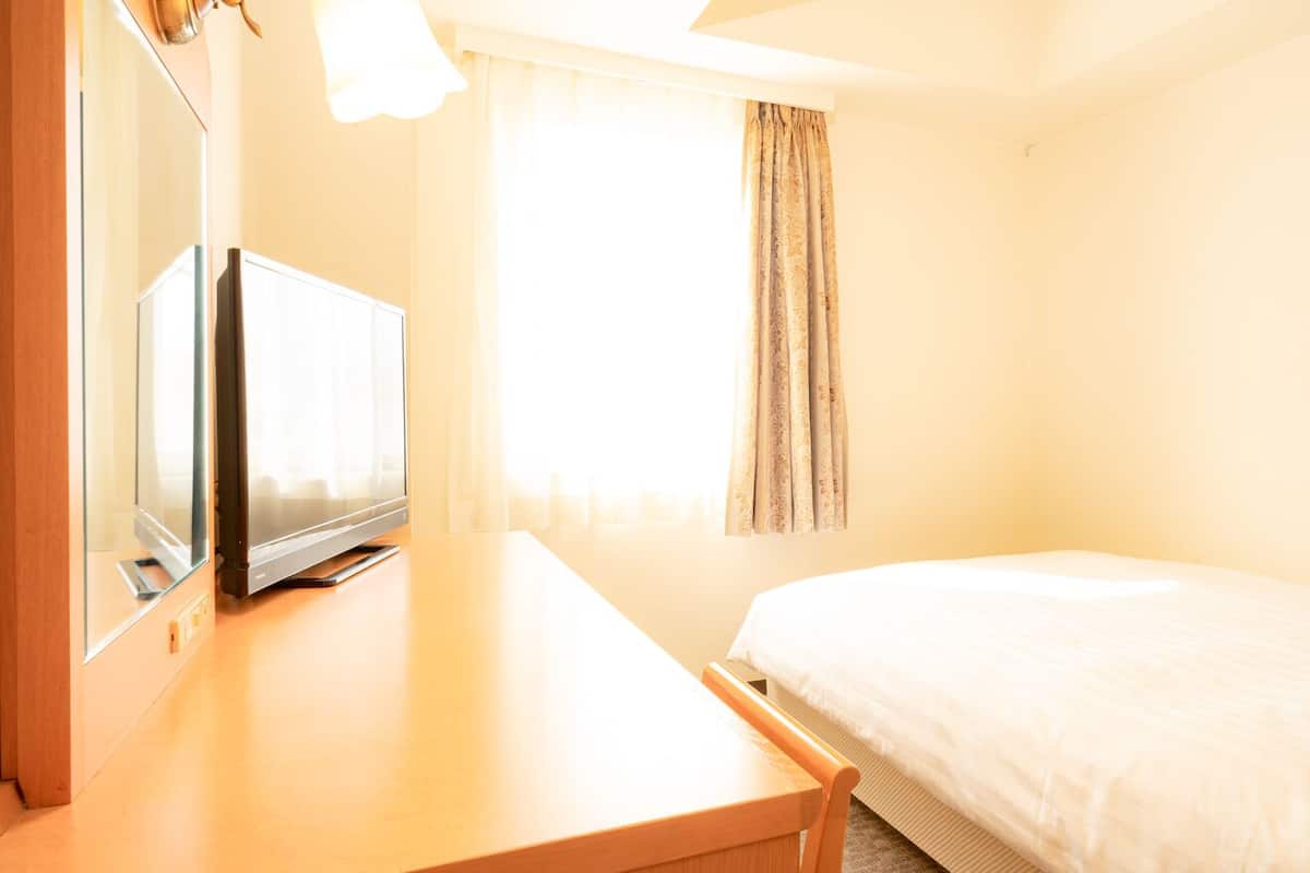 Desk, laptop workspace, blackout drapes, free WiFi