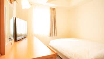 Desk, laptop workspace, blackout curtains, free WiFi