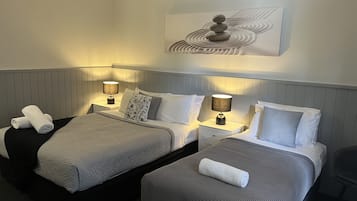 Deluxe Twin - 1 queen and 1 single bed | Desk, iron/ironing board, free WiFi, bed sheets