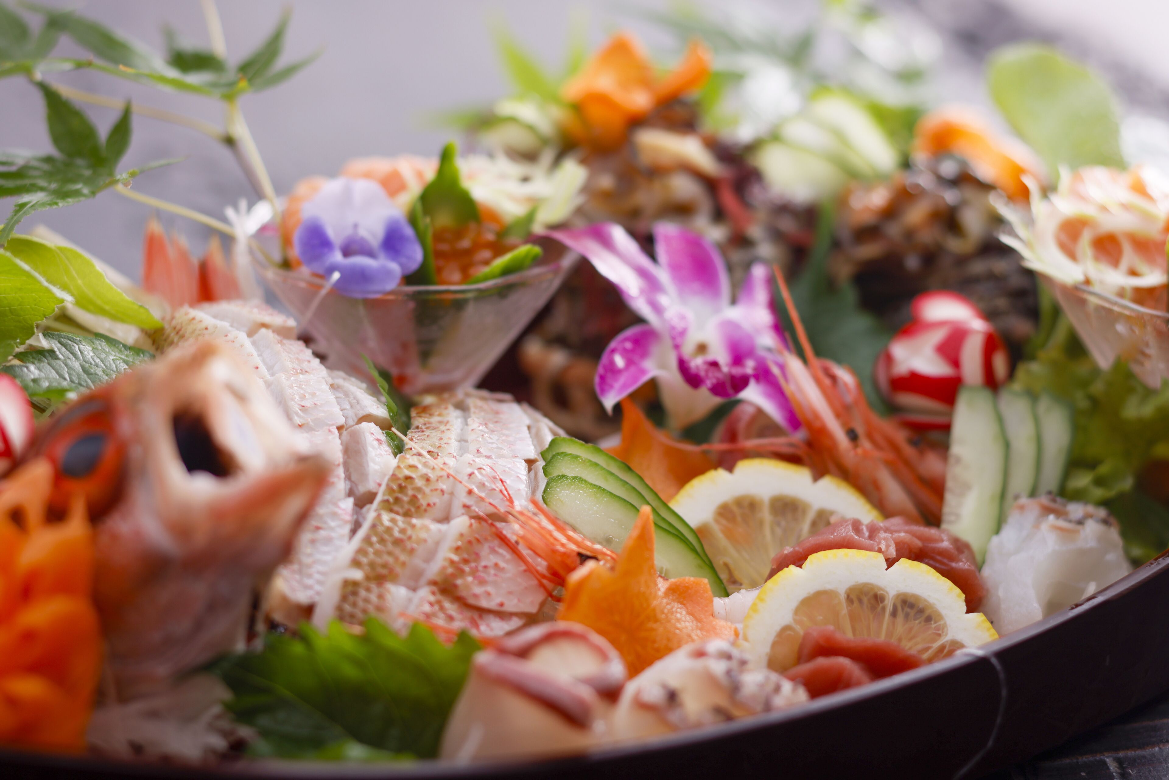 A platter of assorted seafood and vegetables.
