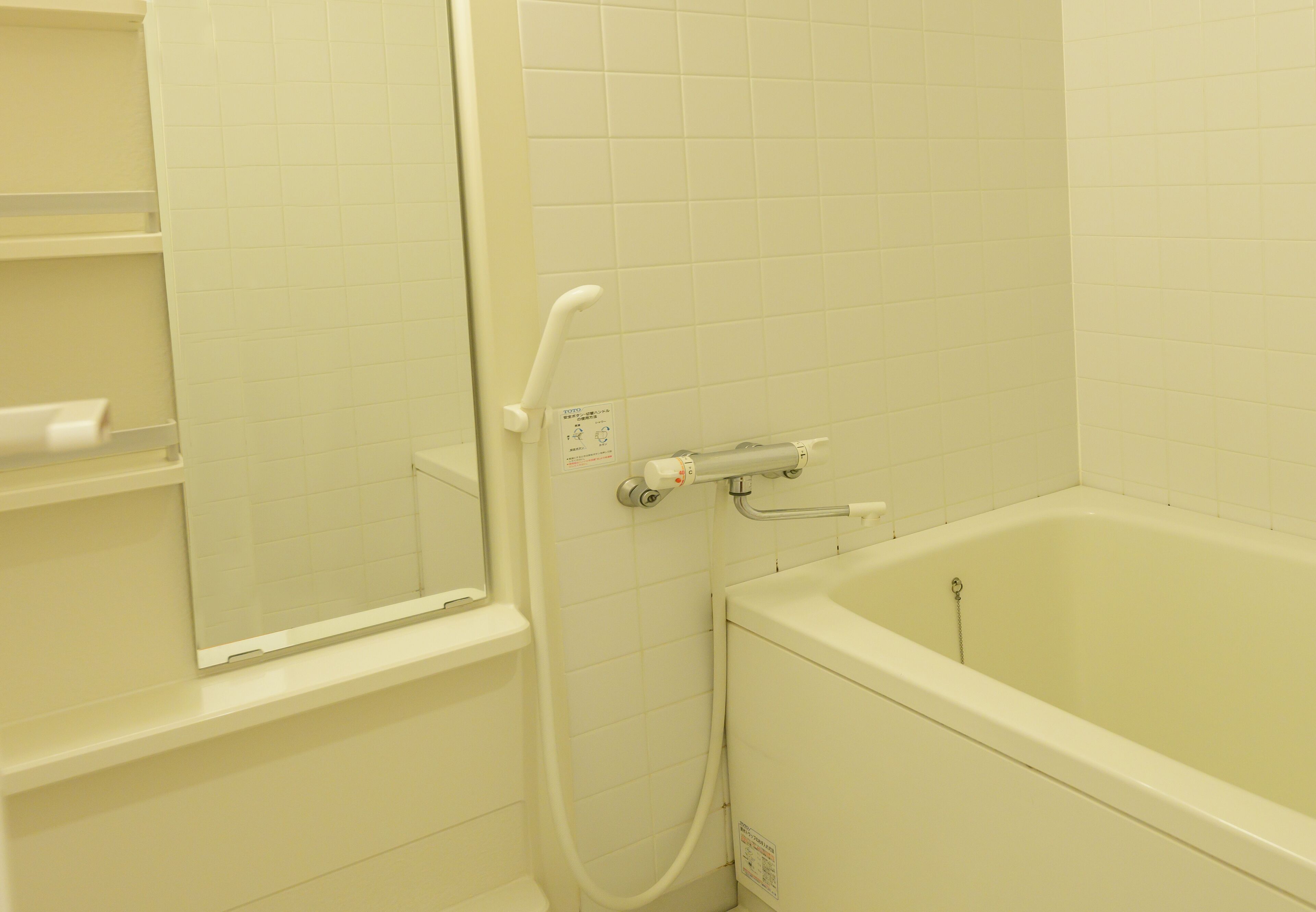 A bathroom with a bathtub, a shower, and a toilet.