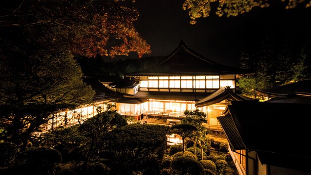 A traditional Japanese building with a large central hall and multiple smaller rooms, surrounded by well-maintained gardens. - Ichijoin (Koya)