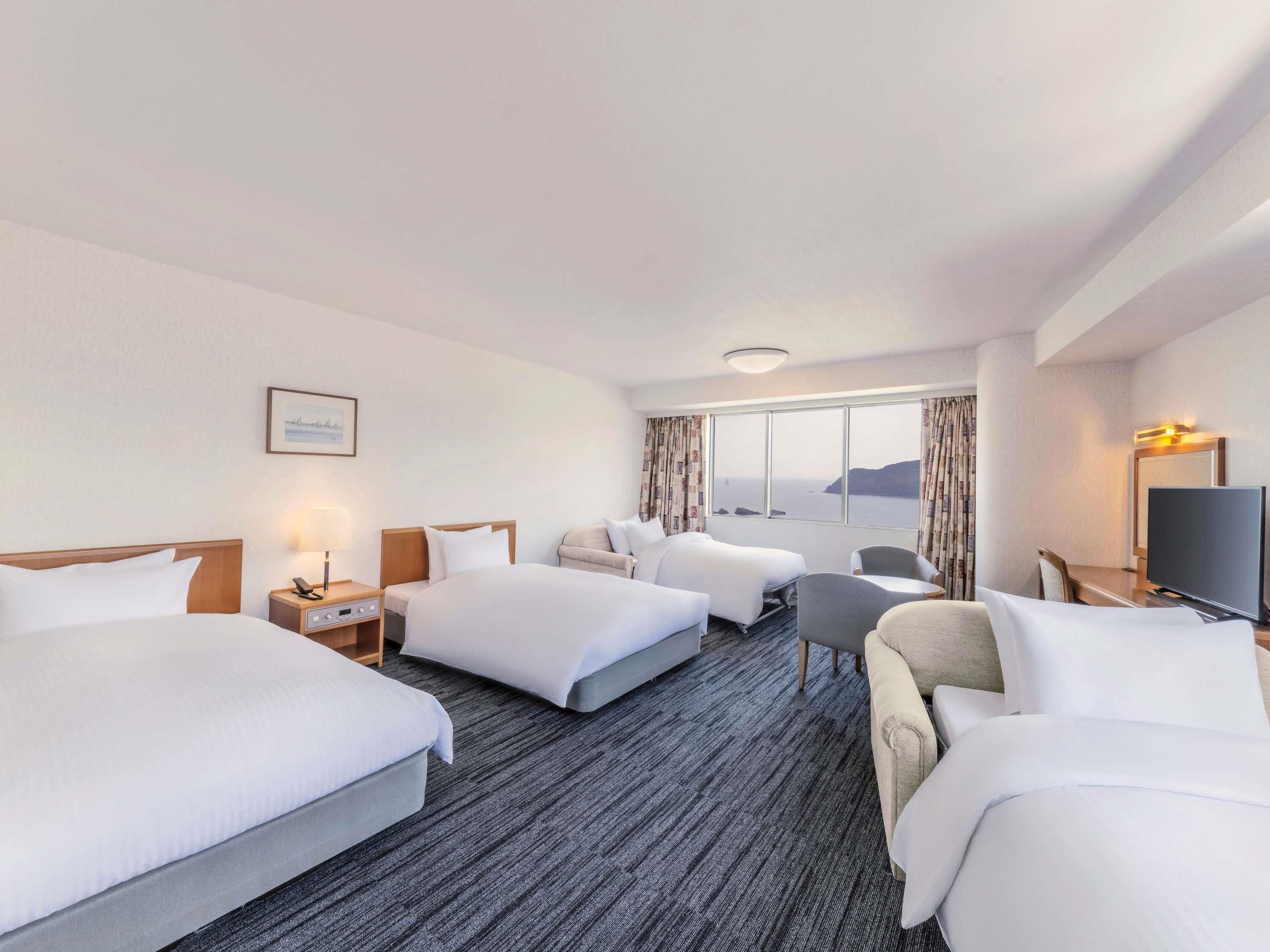 Classic Room, Japanese-Western style, 2 singlebeds and 2 futon beds, Ocean/Sea view | Premium bedding, in-room safe, blackout curtains, soundproofing