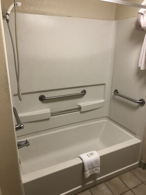Basic Room, 1 King Bed, Accessible, Non Smoking | Bathroom | Combined shower/bathtub, hair dryer, towels - Key West Inn - Lafayette (LaFayette)