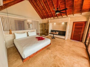 Premium bedding, pillow-top beds, in-room safe, individually decorated - The Resort at Marble Hill (Roatan)