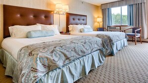 A hotel room with two beds, a desk, and a chair. - The Rhumb Line Resort (Kennebunkport)